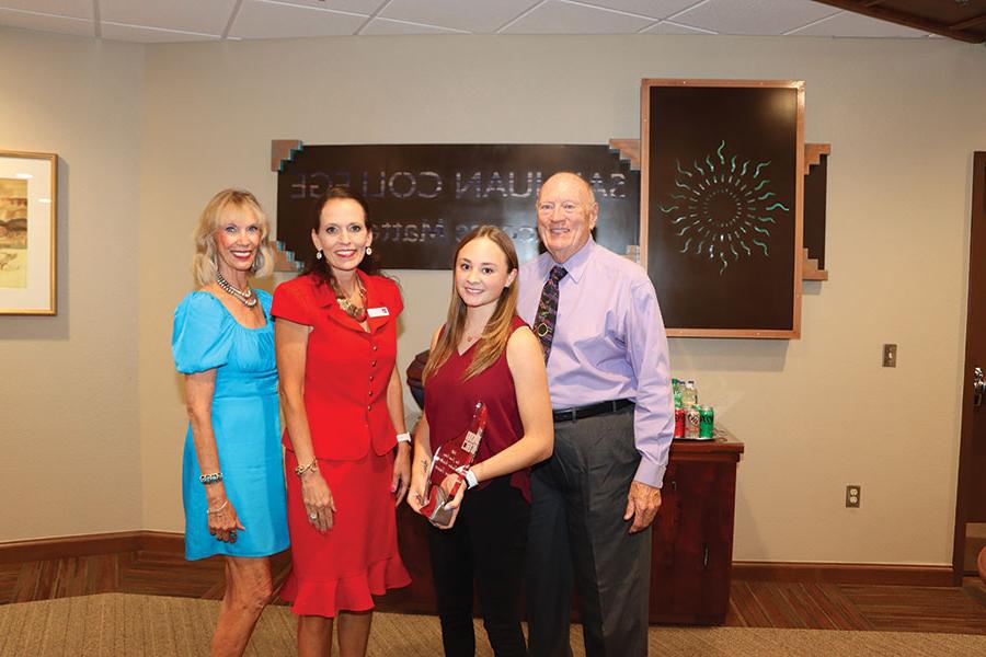 Torince Tanner was presented with her full-ride scholarship at the September board meeting. Left to right: Joe Rasor, Board Chairman; Torince Tanner, Dr. Toni Hopper Pendergrass, San Juan College President; and Gayle Dean, Director of the San Juan College Foundation.