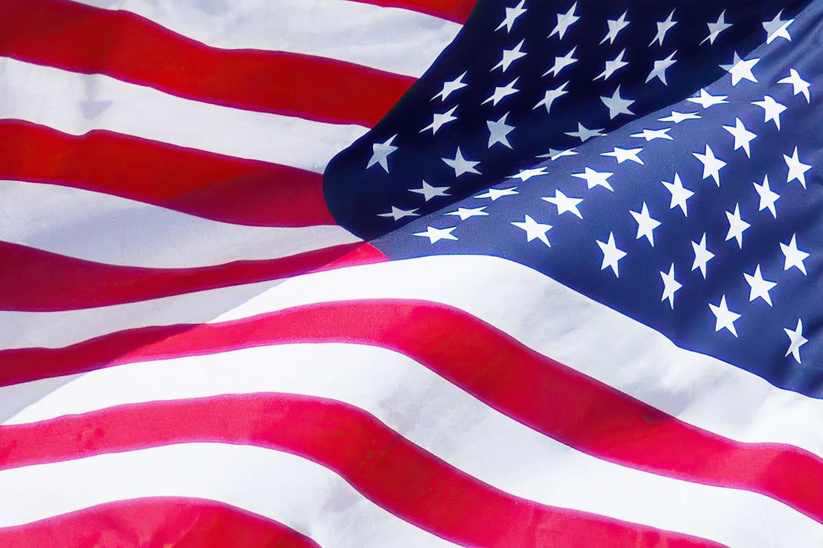 close up american flag rolling in the wind